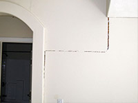 Drywall cracking due to foundation settlement in Shawano
