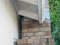 A chimney leaning away from the home on a Mosinee foundation