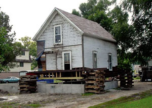 A severely damaged home foundation that is undergoing replacement in Schofield.