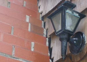 A tilting chimney in Merrill showing serious foundation damage.