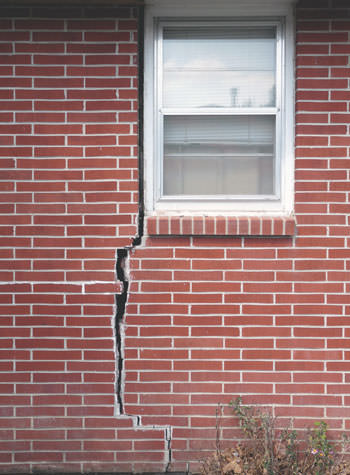 severe foundation wall cracks along a window in Lilburn