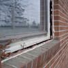 A gap in a window along the outer wall due to foundation settlement of a Rhinelander home.