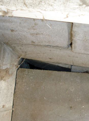 inward rotation of a foundation wall damaged by street creep in a garage in Schofield
