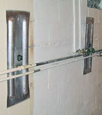A foundation wall anchor system used to repair a basement wall in Mosinee