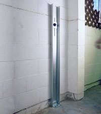 A failing foundation wall repaired with a foundation wall channel anchor system in a Wausau home.