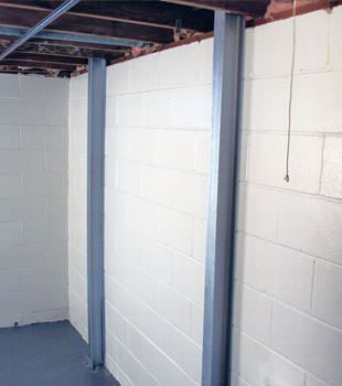 A PowerBrace™ i-beam foundation wall repair system in Appleton