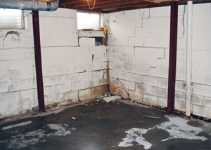 A failed, rusty i-beam foundation wall system installed in Waupun.