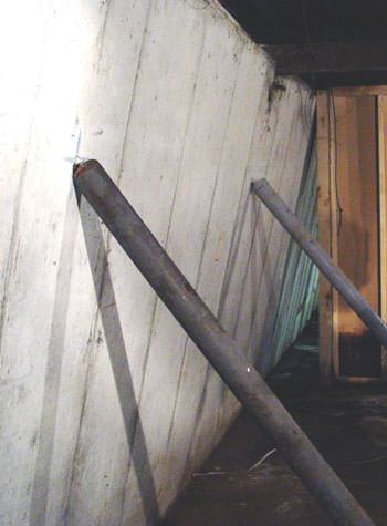 A foundation wall leaning in at the top in Port Washington